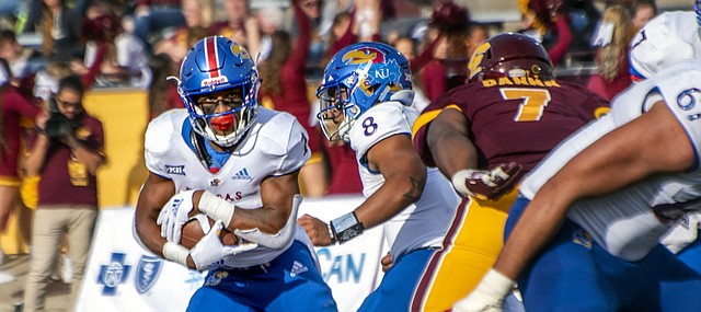 Kansas freshman running back Pooka Williams eyes a running lane against Central Michigan, during the Jayhawks’ 31-7 road win Saturday at Kelly/Shorts Stadium in Mount Pleasant, Mich.