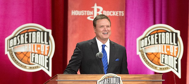 University of Kansas head basketball coach Bill Self smiles as he pays tribute to his players and staff members, past and present, during his inductions speech into the Naismith Memorial Basketball Hall of Fame on Friday, Sept. 8, 2017, at Symphony Hall in Springfield, Mass. At right is former Kansas and NBA head coach Larry Brown, who served as a mentor to Self.