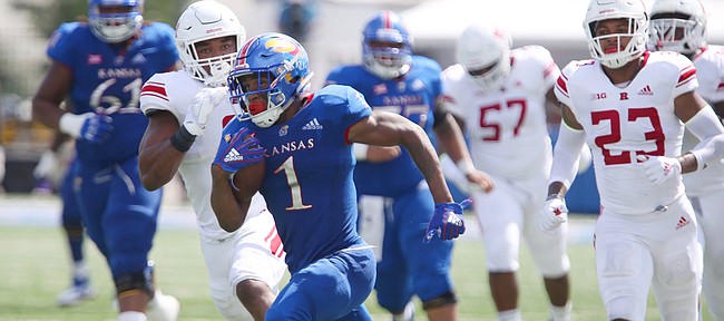 Kansas running back Pooka Williams Jr. (1) takes off on a touchdown run during the fourth quarter on Saturday, Sept. 15, 2018 at Memorial Stadium.