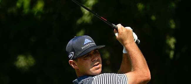 Gary Woodland hits from the second tee box during the first round of the Tour Championship golf tournament Thursday, Sept. 20, 2018, in Atlanta. (AP Photo/John Amis)