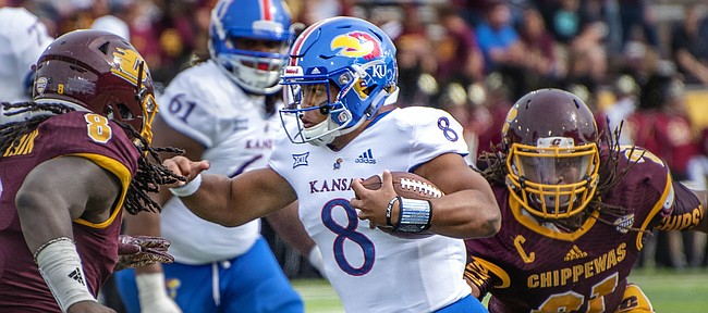 Kansas quarterback Miles Kendrick attempts to run through the Central Michigan defense on Saturday, Sept. 8, 2018 at Kelly/Shorts Stadium in Mount Pleasant, Mich.