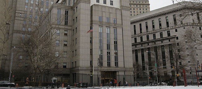 The Daniel Patrick Moynihan federal courthouse, center, is the site of the 2018 college basketball corruption trial in New York City. (AP Photo/Mark Lennihan)