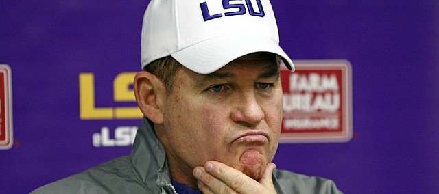 FILE - LSU head coach Les Miles ponders a reporter's question's following an NCAA college football game against Mississippi in Oxford, Miss., Saturday, Nov. 21, 2015. Mississippi won 38-17. (AP Photo/Rogelio V. Solis)
