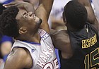 Kansas center Udoka Azubuike (35) gets physical with Vermont forward Ra Kpedi (15) during the first half, Monday, Nov. 12, 2018 at Allen Fieldhouse.