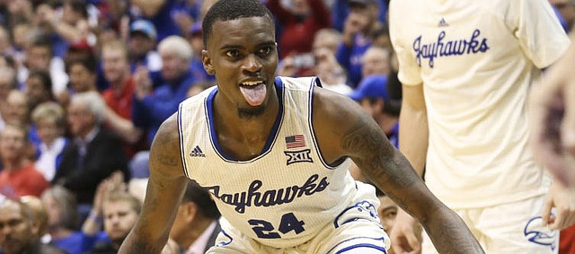 Kansas guard Lagerald Vick (24) sticks out his tongue in celebration after connecting from the corner on a 3-pointer during the second half against Louisiana on Friday, Nov. 16, 2018 at Allen Fieldhouse.
