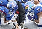 Kansas running back Pooka Williams Jr. (1) and Kansas running back Khalil Herbert (10) celebrate a touchdown by Williams by bowing to each other during the fourth quarter on Friday, Nov. 23, 2018 at Memorial Stadium.