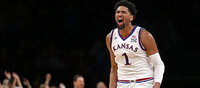 Kansas forward Dedric Lawson reacts after scoring a basket during overtime of the team's NCAA college basketball game against Tennessee in the NIT Season Tip-Off tournament Friday, Nov. 23, 2018, in New York. Kansas defeated Tennessee 87-81. (AP Photo/Adam Hunger)