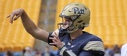 FILE — Former Pittsburgh quarterback Thomas MacVittie (7) warms up before the annual Pittsburgh Spring NCAA football scrimmage, Saturday, April 15, 2017, in Pittsburgh. MacVittie, who played the 2018 season at Mesa Community College (Ariz.) announced on Dec. 11, 2018, his plans to sign with the University of Kansas. (AP Photo/Keith Srakocic)

