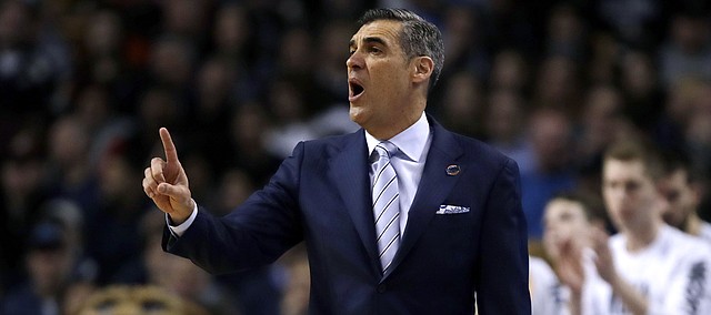 Villanova head coach Jay Wright gestures from the sideline during the first half of an NCAA men's college basketball tournament regional final against Texas Tech, Sunday, March 25, 2018, in Boston. (AP Photo/Charles Krupa)