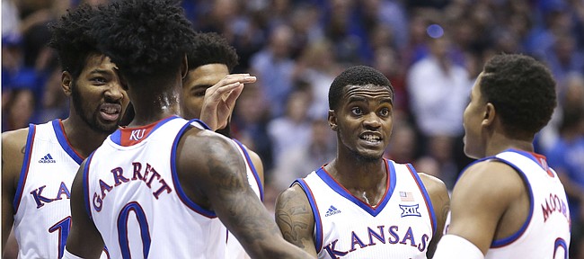 Kansas guard Lagerald Vick (24) tries to rally The Jayhawks during the first half, Saturday, Dec. 15, 2018 at Allen Fieldhouse.