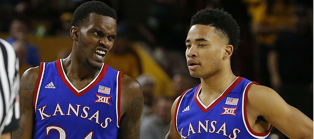 Kansas guard Lagerald Vick (24) and Devon Dotson (11) in the first half during an NCAA college basketball game against Arizona State, Saturday, Dec. 22, 2018, in Tempe, Ariz. (AP Photo/Rick Scuteri)