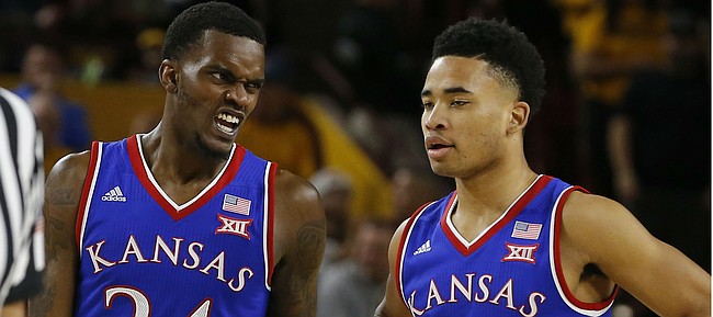 Kansas guard Lagerald Vick (24) and Devon Dotson (11) in the first half during an NCAA college basketball game against Arizona State, Saturday, Dec. 22, 2018, in Tempe, Ariz. (AP Photo/Rick Scuteri)