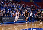 Kansas guard Brianna Osorio (2) races down the court to beat the final second in the half as Vermont's Josie Larkins (5) and Carmen Handy (32) try to guard her on Sunday, Dec. 30, 2018 at Allen Fieldhouse.