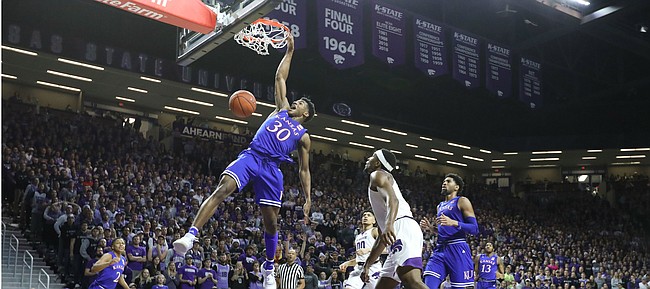 Kansas guard Ochai Agbaji (30) soars in for a dunk against Kansas State during the first half, Tuesday, Feb. 5, 2019 at Bramlage Coliseum.