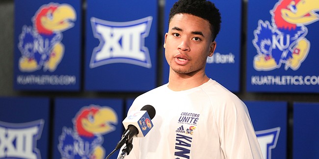 Kansas guard Devon Dotson talks with media members during a press conference following the NCAA selection show on Sunday, March 17, 2019 at Allen Fieldhouse. The Jayhawks will play the Huskies in the opening round on Thursday in Salt Lake City, Utah.