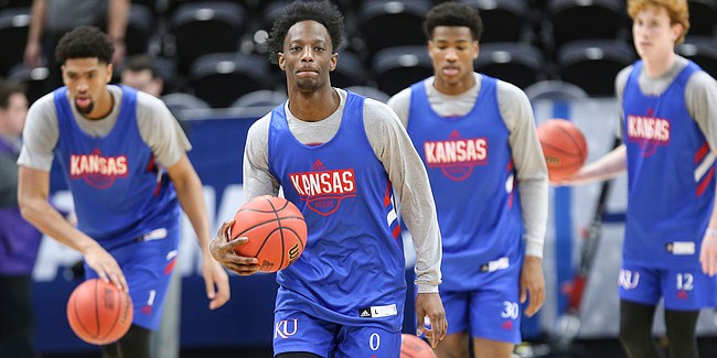 Kansas guard Marcus Garrett (0) and his teammates take off up the court as they get warmed up for a shoot around on Wednesday, March 20, 2019 at Vivint Smart Home Arena in Salt Lake City, Utah. Teams practiced and gave interviews to media members before Thursday's opening round games.