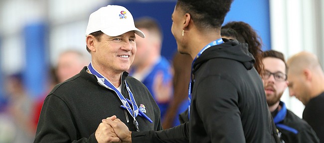 Kansas head coach Les Miles greets new signee Jayden Russell who was in attendance for football practice on Wednesday, March 6, 2019 within the new indoor practice facility.