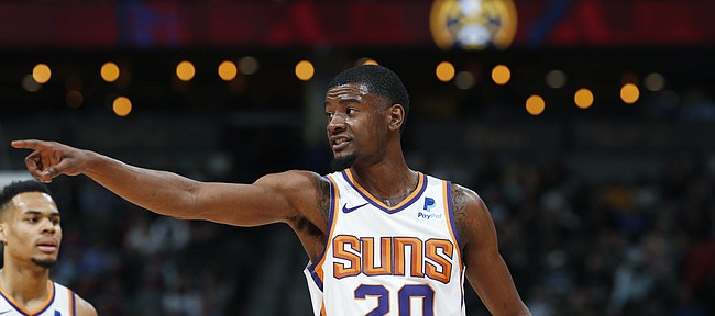 Phoenix Suns forward Josh Jackson (20) in the first half of an NBA basketball game Friday, Jan. 25, 2019, in Denver. (AP Photo/David Zalubowski)