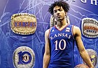 New Kansas commitment Jalen Wilson, a 6-foot-8, 210-pound wing forward from Denton, Texas, poses in KU gear during his visit to Lawrence in late May of 2019. Wilson picked the Jayhawks over North Carolina and Michigan on Wednesday, June 12, 2019. 