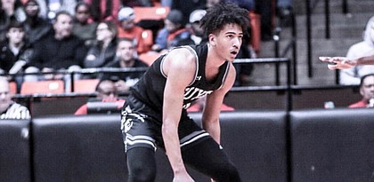 New Kansas signee Jalen Wilson looks to take an opponent off the dribble during a game at Guyer High in Texas during his senior season. Wilson, who will wear No. 10 for Kansas during the 2019-20 season, signed with the Jayhawks on June 12, 2019. 