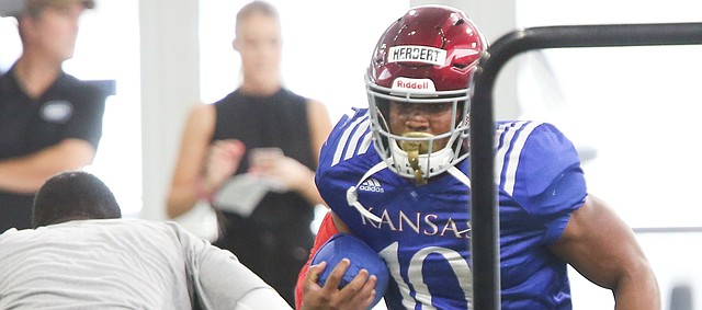 Kansas running back Khalil Herbert makes a move during practice on Thursday, Aug. 8, 2019.