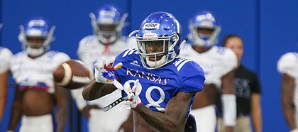 Kansas receiver Jamahl Horne pulls in a pass during practice on Thursday, Aug. 8, 2019.