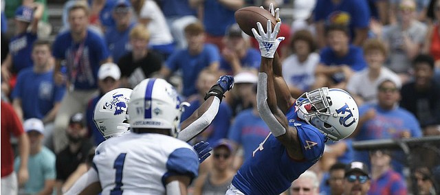 Kansas wide receiver Andrew Parchment reaches out for a reception against Indiana State Saturday afternoon at David Booth Kansas Memorial Stadium on Aug. 31, 2019.