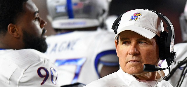 (Boston, MA, 09/13/19) Kansas Jayhawks head coach Les Miles look back to the sidelines during a timeout in the second half of an NCAA football game against Boston College in Boston, Mass., on Friday, September 13, 2019.