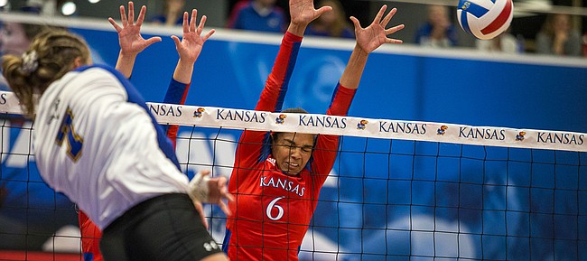 KU volleyball senior middle blocker Zoe Hill goes up for a block against Morehead State. KU defeated Morehead State 3-0 Thursday, Sept. 12.