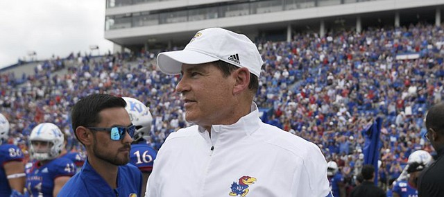 Kansas head coach Les Miles walks on the field after defeating Indiana State Saturday afternoon at David Booth Kansas Memorial Stadium on Aug. 31, 2019.