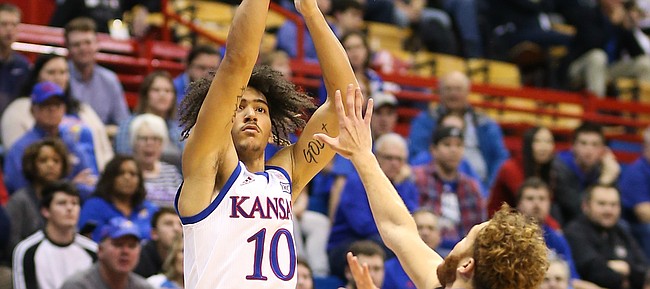 Kansas forward Jalen Wilson (10) puts up a three from the wing during the second half, Thursday, Oct. 24, 2019 at Allen Fieldhouse.