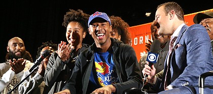 New Kansas basketball commitment Bryce Thompson flashes a smile after revealing his college choice during a ceremony at Booker T. Washington High in Tulsa, Okla., on Tuesday, Nov. 12, 2019. 