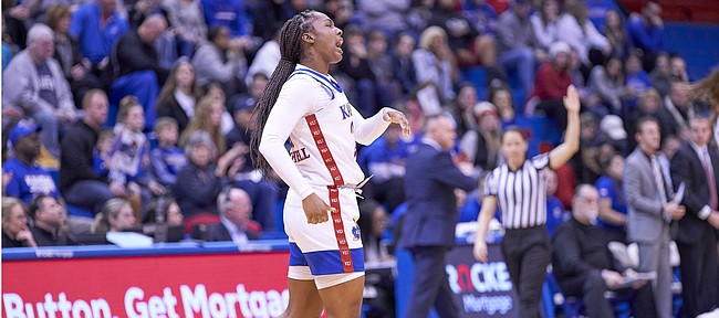 Kansas sophomore Brooklyn Mitchell (21) celebrates after she creates a turnover during KU's nonconference finale Monday night at Allen Fieldhouse on Dec. 30, 2019.