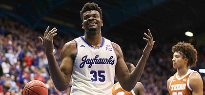 Kansas center Udoka Azubuike (35) accepts the applause of the crowd after getting a bucket and a Texas foul during the second half on Monday, Feb. 3, 2020 at Allen Fieldhouse.