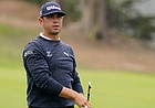 Gary Woodland watches his shot on the 14th hole during the first round of the PGA Championship golf tournament at TPC Harding Park Thursday, Aug. 6, 2020, in San Francisco. (AP Photo/Charlie Riedel)