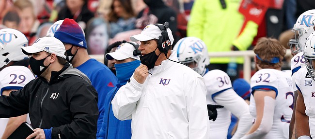 Kansas coach Les Miles yells out to the team during the second half of an NCAA college football game against Texas Tech, Saturday, Dec. 5, 2020, in Lubbock, Texas. (AP Photo/Brad Tollefson)