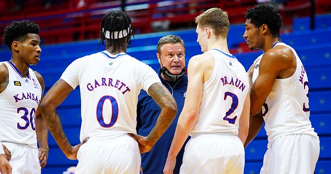 Kansas head coach Bill Self talks to his players with the game close and little time remaining in regulation on Saturday, Jan. 9, 2021 at Allen Fieldhouse.