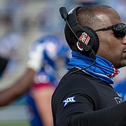 Kansas receivers coach and passing game coordinator Emmett Jones coaches from the sideline in this file photo from the  2020 season. KU named Jones the football team's interim head coach on March 11, 2021.