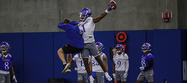 Kansas safety Kenny Logan Jr. celebrates after making a play during the Jayhawks' first spring football practice, on March 30, 2021.