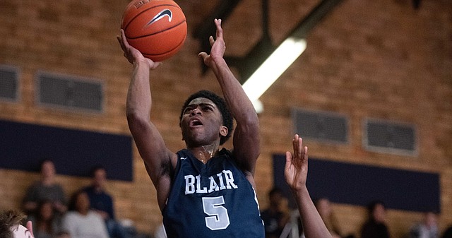 Kansas basketball signee Kyle Cuffe Jr. hangs in the air during a prep game for Blair Academy. Originally ranked as the 56th-best prospect in the 2022 class, Cuffe reclassified into the 2021 class and is now expected to join the Jayhawks in time for the 2021-22 season. 