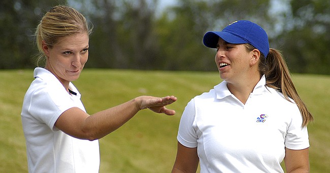 KU womens golf coach Erin O'Neil, left, visits with KU golfer Annie Giangrosso, as Giangrosso waits to tee off at the 2006 Marilynn Smith Sunflower Invitational.