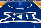 The Big 12 Conference logo is shown here in the lane of the north goal at Allen Fieldhouse. 