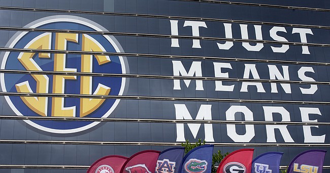 The SEC logo is displayed at the Hyatt Regency hotel, site of the NCAA college football Southeastern Conference Media Days, Monday, July 19, 2021, in Hoover, Ala. 


