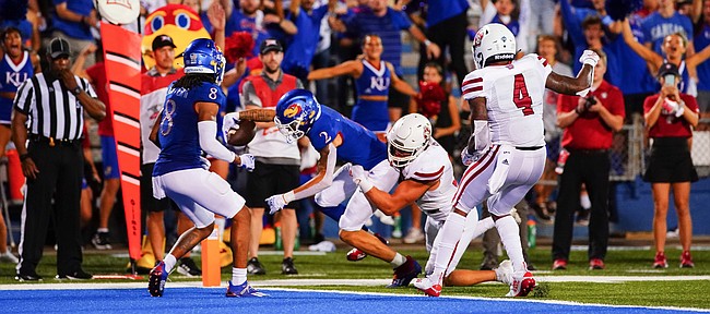 Kansas wide receiver Lawrence Arnold (2) reaches the ball into the end zone for what proved to be the winning touchdown late in the fourth quarter on Friday, Sept. 3, 2021 at Memorial Stadium. (Photo by Nick Krug/Special to the Journal-World)