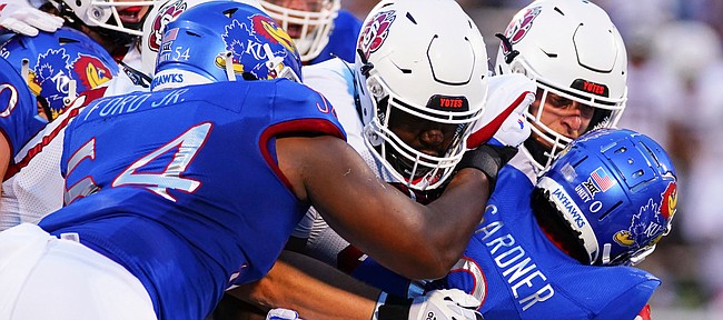 Kansas running back Velton Gardner (0) is stuffed on a run by the South Dakota defense during the first quarter on Friday, Sept. 3, 2021 at Memorial Stadium. (Photo by Nick Krug/Special to the Journal-World)