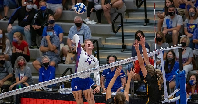 Kansas freshman Caroline Bien swings at a ball during the Jayhawks' home sweep of Wichita State on Friday, Sept. 10, 2021 at Horejsi Family Volleyball Arena. 