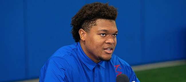 Kansas offensive lineman Earl Bostick Jr. talks with media members during interview on Tuesday, Aug. 17, 2021 at the Indoor Practice Facility.