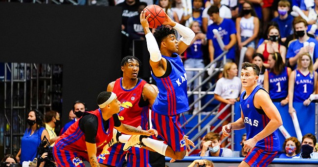 Kansas Jayhawks guard Remy Martin (11) gets up to throw a pass during the Late Night in the Phog scrimmage, Friday, Oct. 1, 2021 at Allen Fieldhouse.