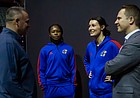 Kansas women's basketball coach Brandon Schneider, along with Jayhawks Zakiyah Franklin, left, and Holly Kersgieter, visit with KU Athletic Director Travis Goff, right, at Big 12 Media Day on Tuesday, Oct. 19, 2021 in Kansas City, Mo. 