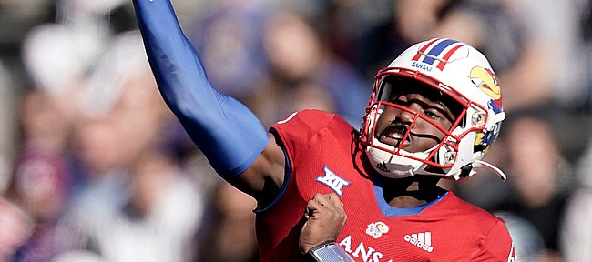 Kansas quarterback Jalon Daniels (6) throws during the second half of an NCAA football game against Kansas State Saturday, Nov. 6, 2021, in Lawrence, Kan. (AP Photo/Charlie Riedel
